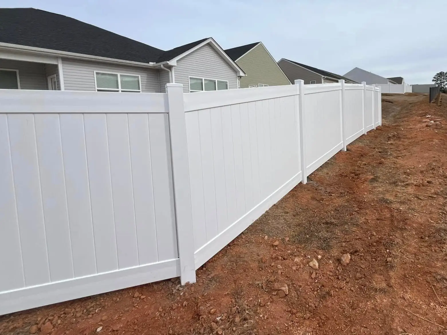 White vinyl privacy fence installed by Spartan Fence SC in Lyman, SC