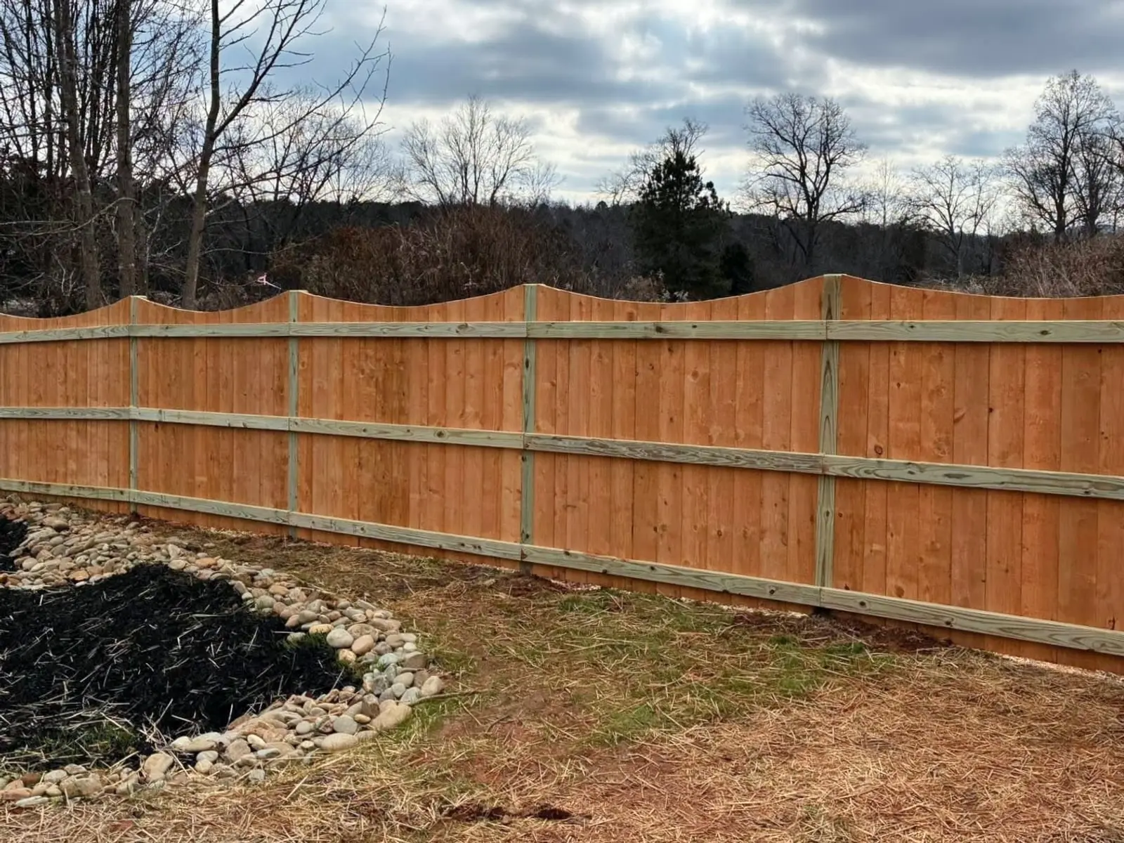 Scalloped wood privacy fence built by Spartan Fence SC in Greer, SC